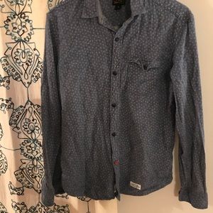 Button down with light pattern. Size medium.